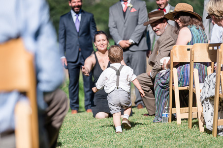 ring bearer running to his mother crying