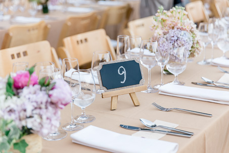 little chalkboard on a wooden easel - wedding table number