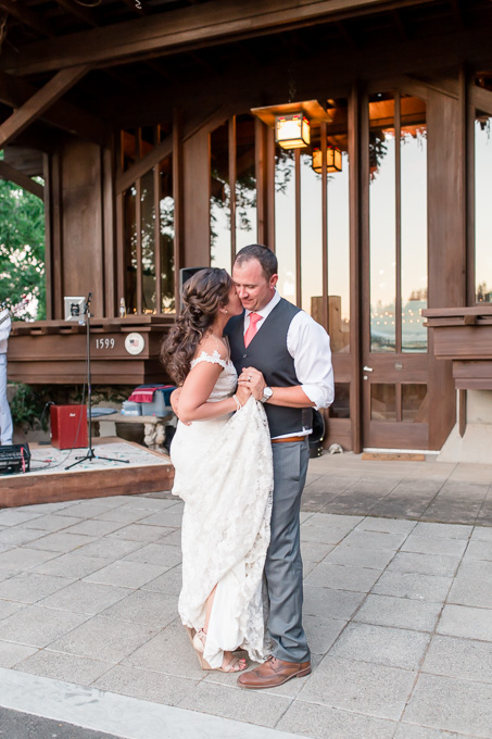 first dance in front of the wooden building
