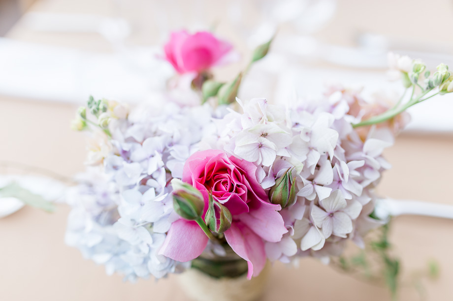 pastel color hydrangea and pink rose centerpieces