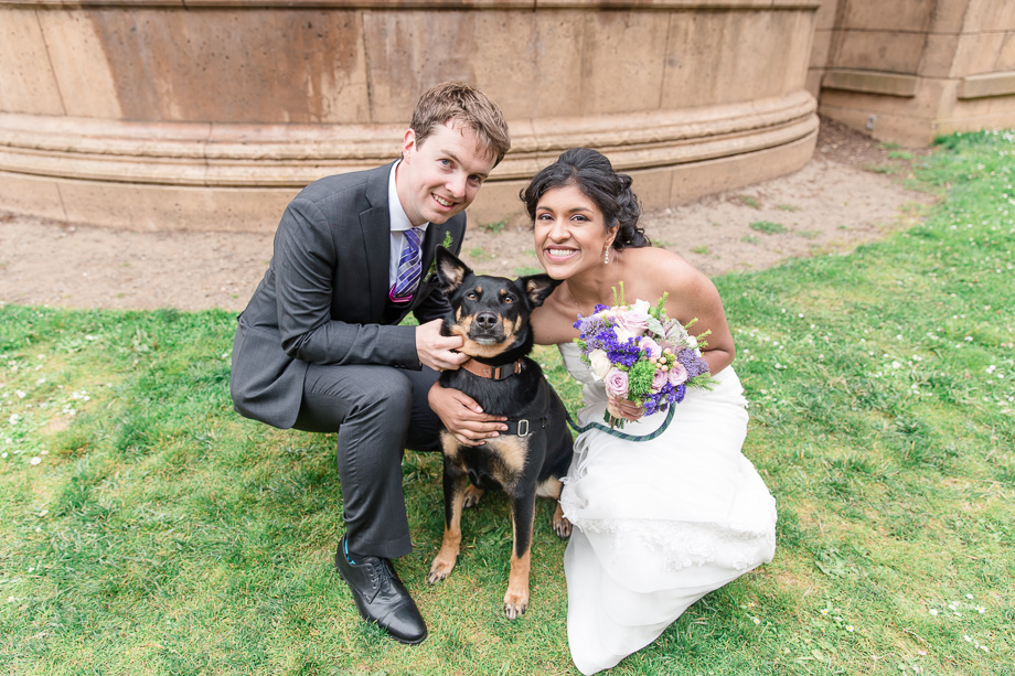 family photo bride groom and their beloved puppy