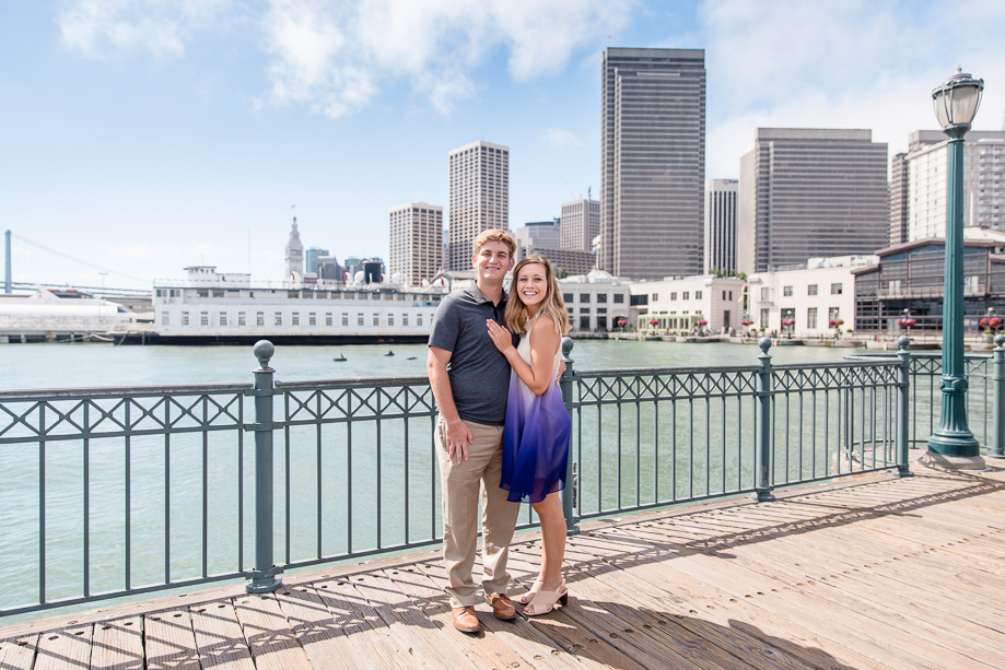 beautiful couple in front of san francisco skyline