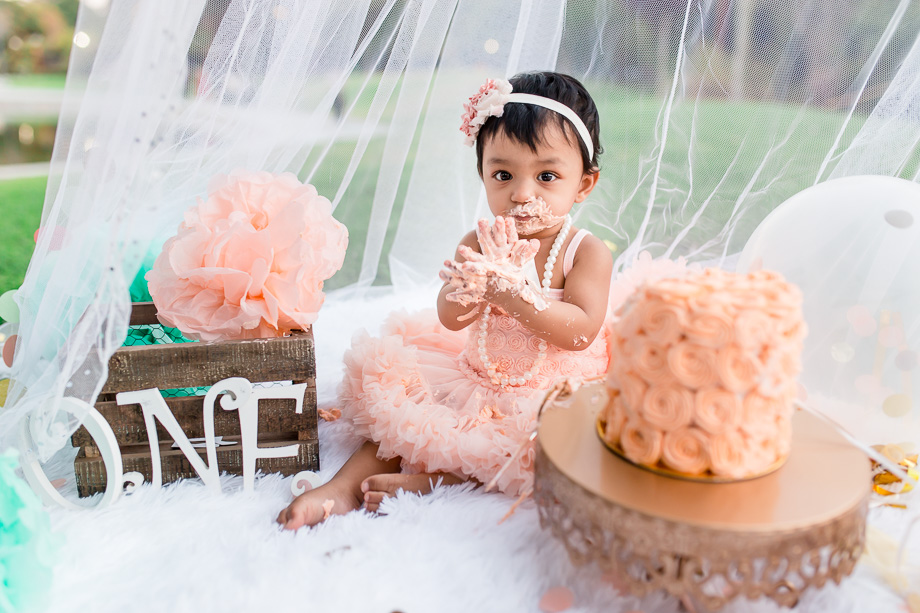 bay area cute baby girl outdoor one year cake smash portrait