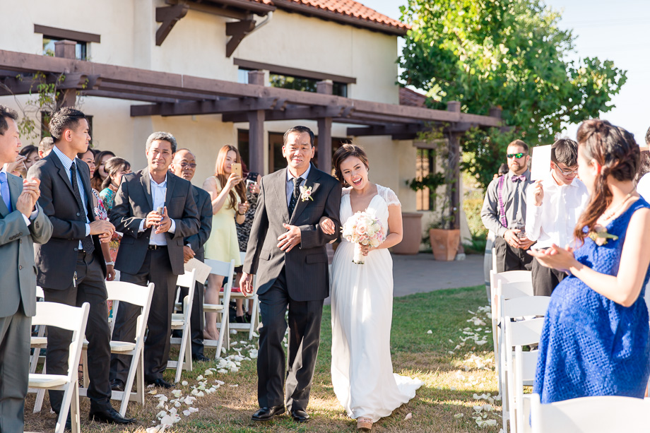 bride escorted down the aisle by her beloved father - Beay Area winery wedding