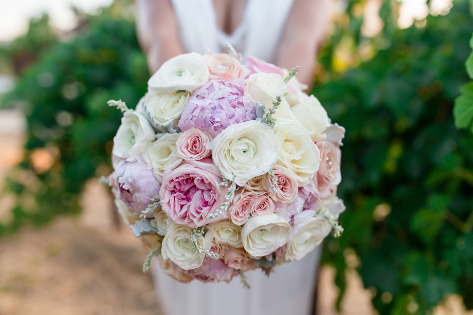 beautiful and airy peony english garden rose bridal bouquet for this white and blush travel themed winery wedding