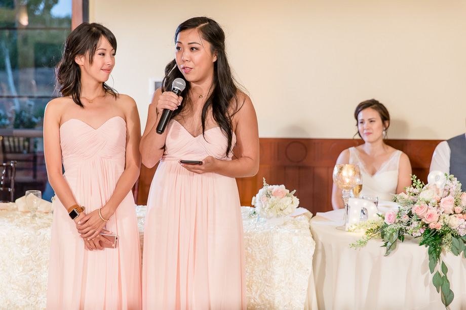 bridesmaids toasting to the newlyweds