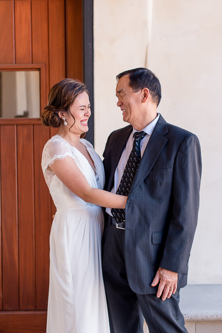 bride sees her dad for the first time on her wedding day