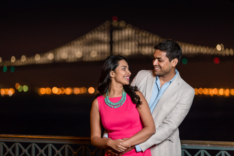 night engagement photo of San Francisco Bay Bridge