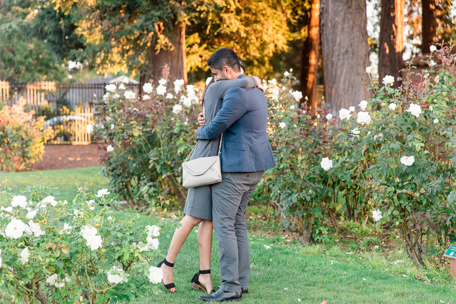 a sweet hug after the San Jose surprise engagement proposal