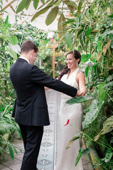 bride and groom first look inside the greenhouse at conservatory of flowers