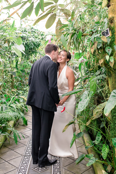 an intimate first look surrounded by beautiful green plants - san francisco garden wedding