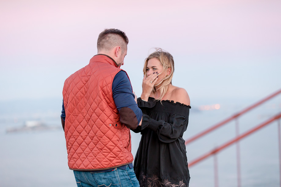 beautiful pink sunset surprise engagement proposal at Golden Gate Bridge
