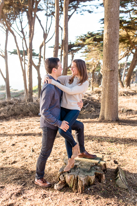 cute save the date photo on a tree trunk
