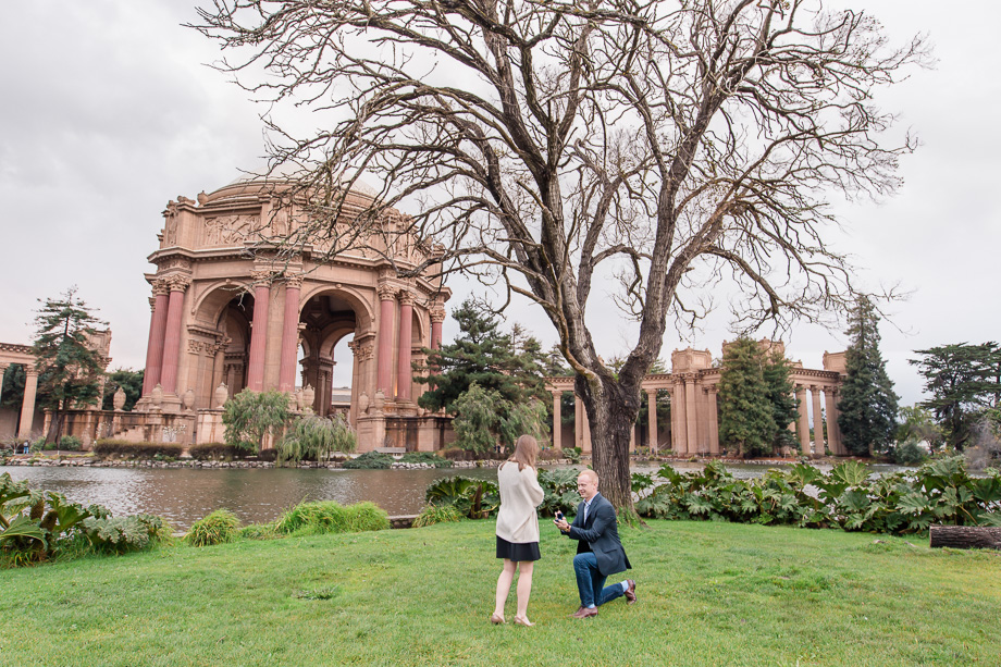 surprise proposal on a rainy day at the palace of fine arts