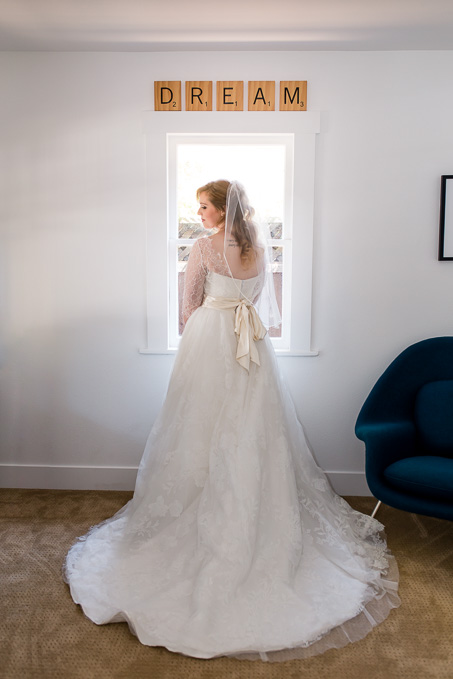 a peek of this beautiful A-line wedding dress from the back