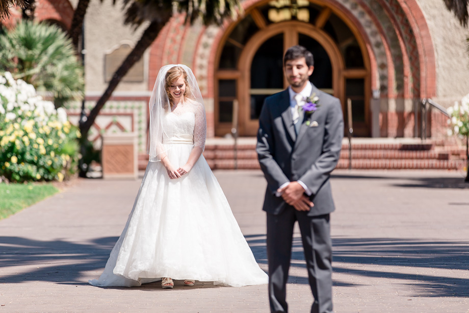 a meaningful first look at the University where the bride and groom first met