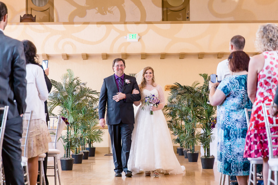 bride walking down the aisle escorted by father - San Jose wedding