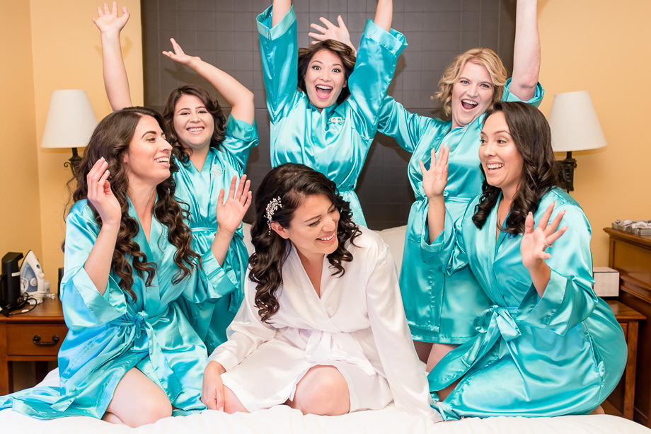 fun bridal party picture with tiffany blue robes