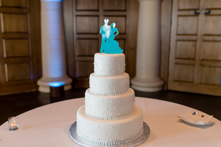 elegant wedding cake with tiffany blue cake topper