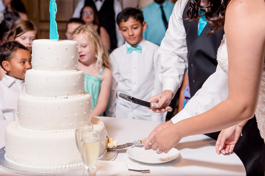 kids cant wait to eat the wedding cake