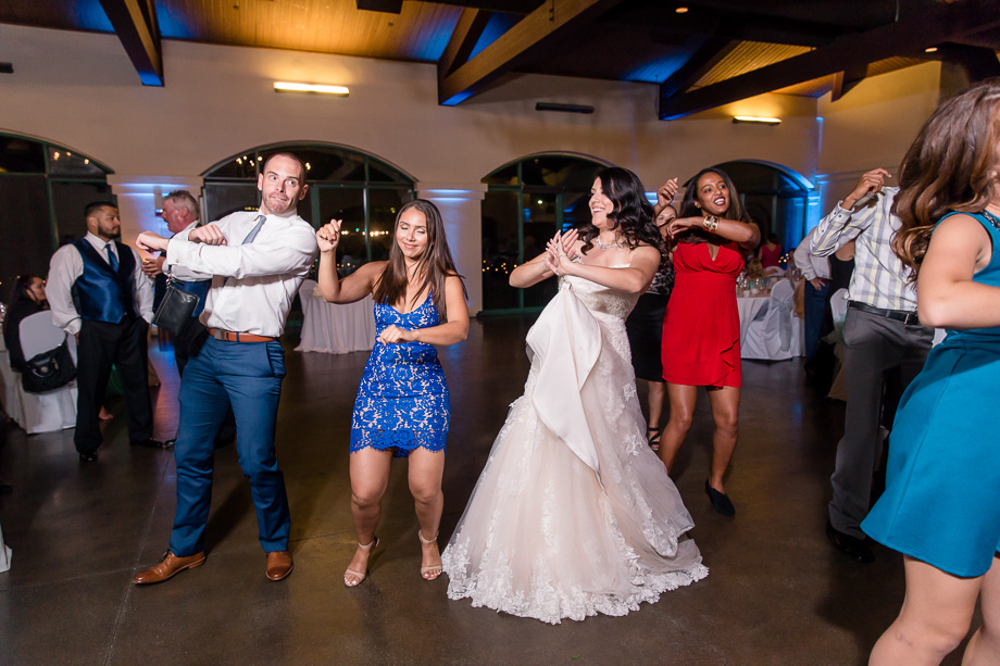 a fun group dance at the wedding reception