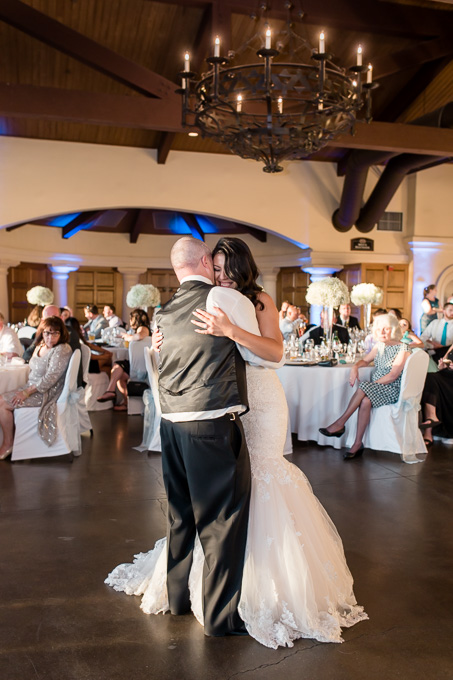 newlywed enjoying their first dance as husband and wife