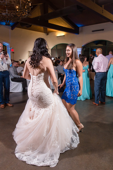 bride dancing with a guest