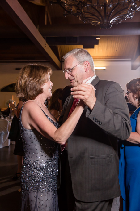 couples enjoying the slow dance at the wedding reception
