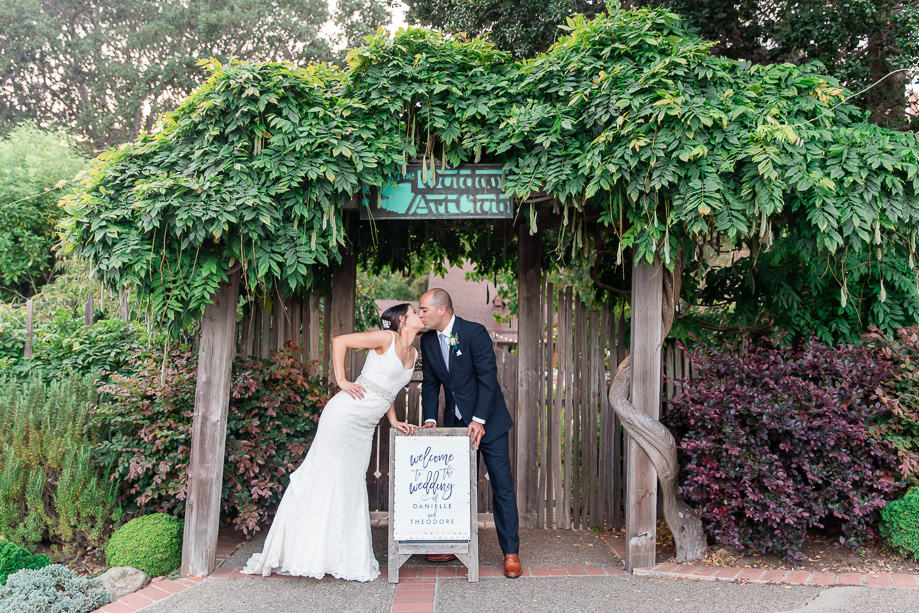 Outdoor Art Club front gate makes a beautiful backdrop for wedding photos
