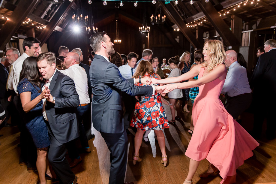wedding guests owning the dance floor at the Outdoor Art Club reception hall