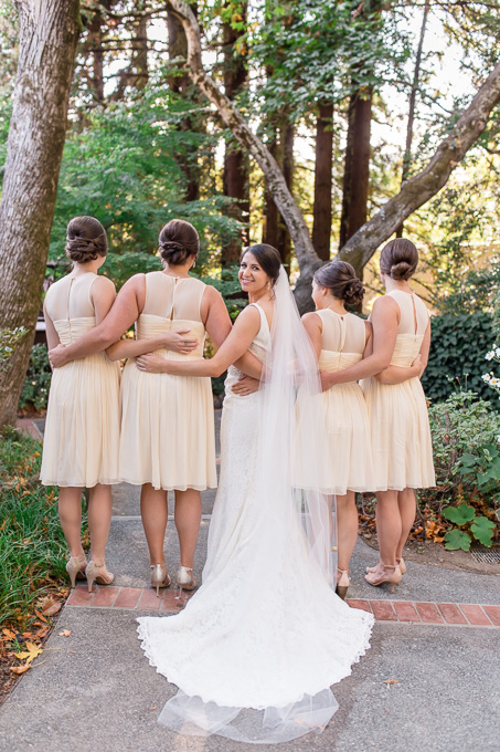 a back shot of the bride and her lovely bridesmaids at Outdoor Art Club
