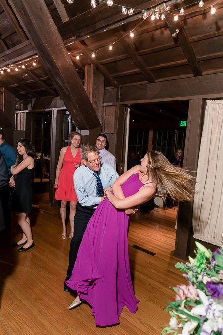 guest whipping her hair at the wedding dance party