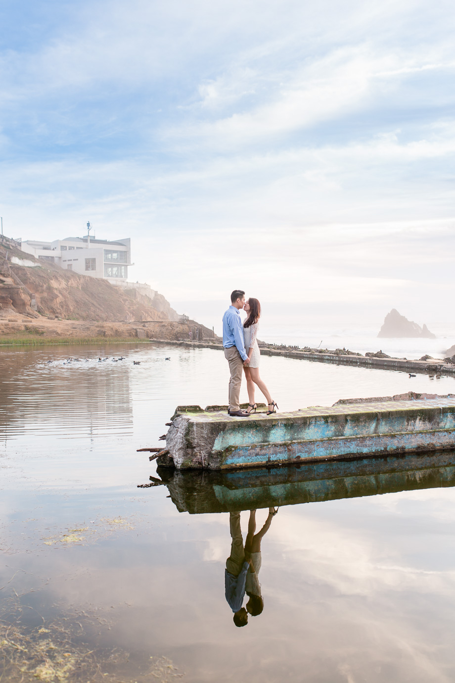 bright and crisp san francisco engagement photo with reflections in the water