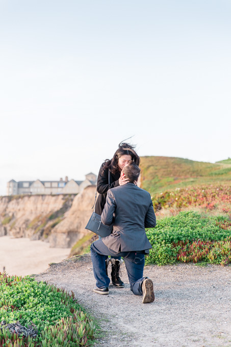 they got engaged at the cliff up on a beach in font of Ritz Carlton