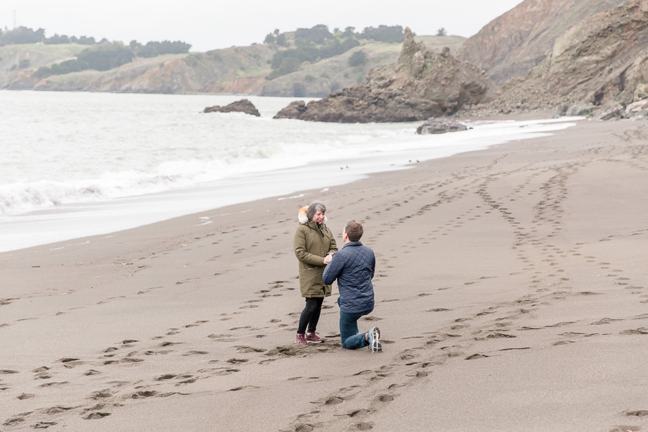 a surprise engagement proposal at Black Sands Beach in San Francisco