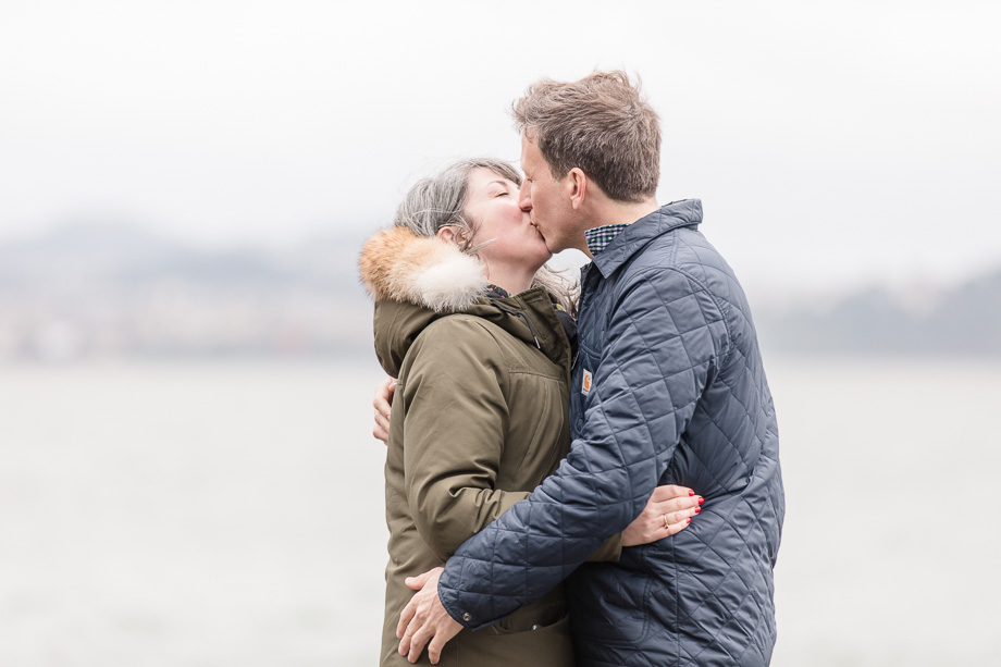 romantic kiss after surprise proposal