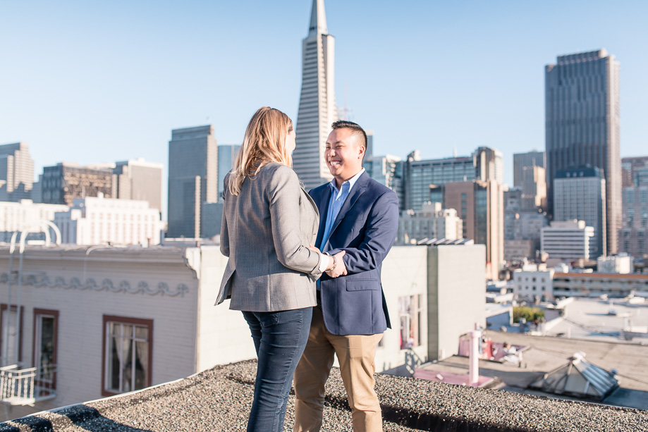 engagement photo couple looking at each other Transamerica Pyramid