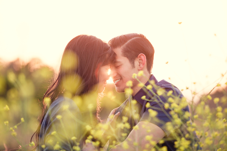 Kissing in the sunset, romantic engagement photo - Shoreline Park, Mountain View