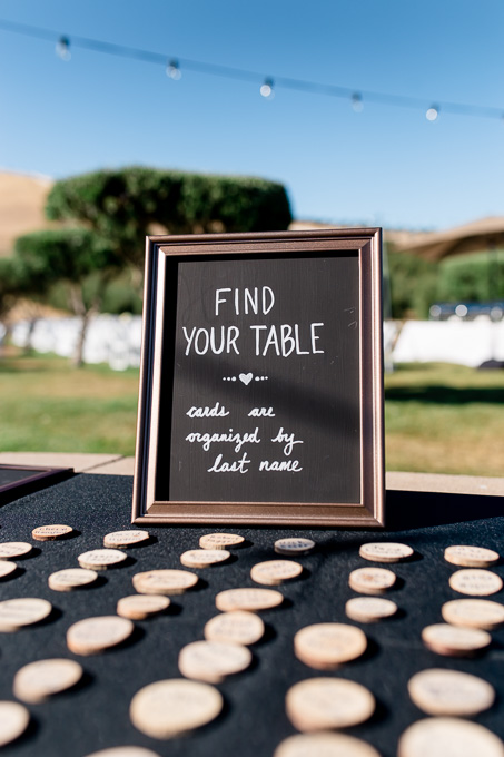 little rustic wooden escort cards for seating assignment - bay area wedding