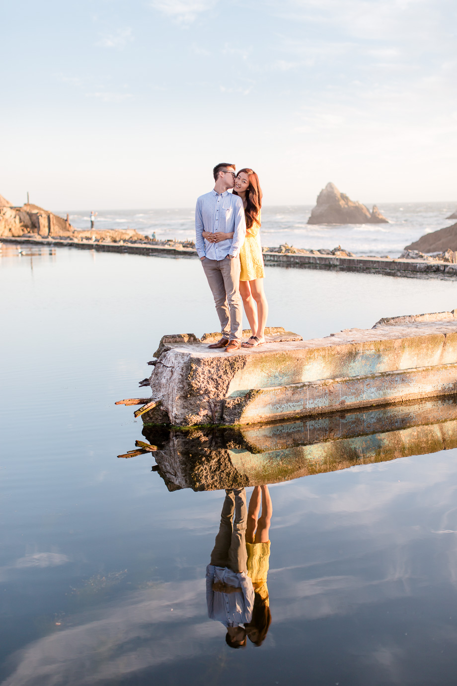 lands end sunset waterfront engagement photo with reflection