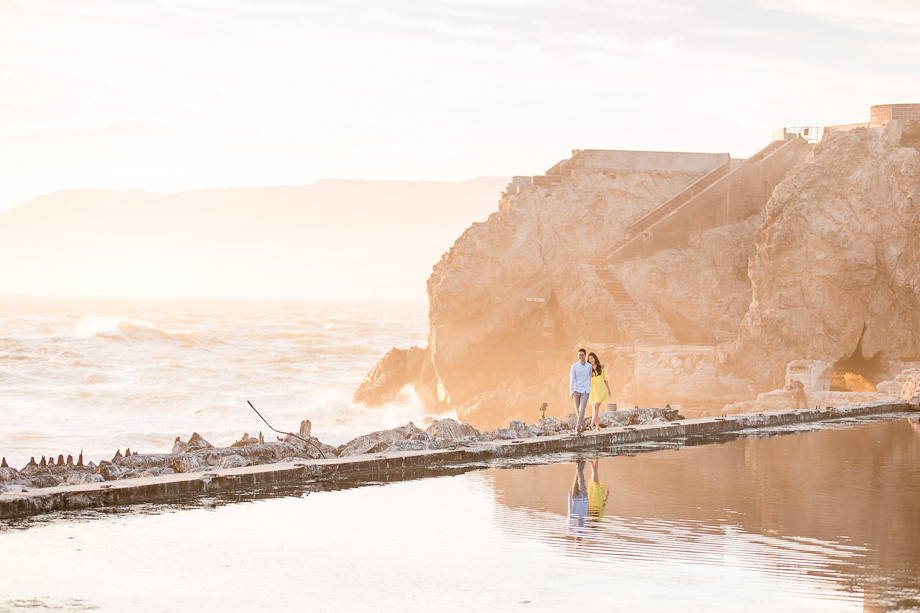 San Francisco save the date photo by the ocean with dreamy golden sunlight