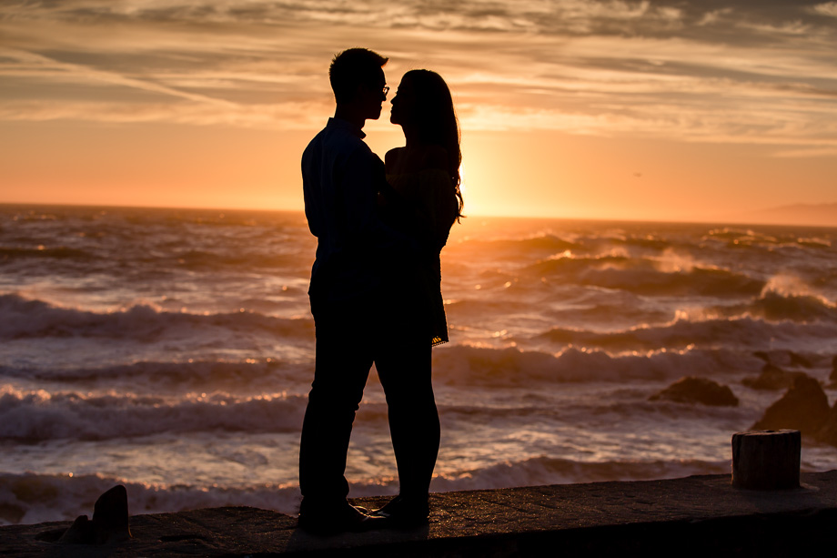 sunset silhouette portrait by the Pacific ocean - bay area engagement photographer