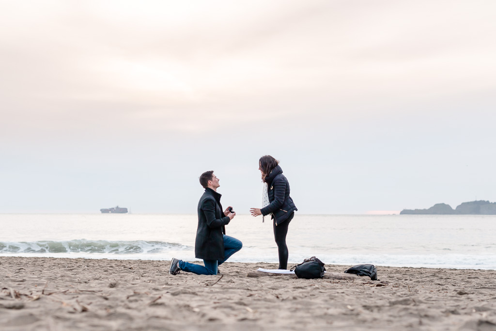 he popped the question at a beach