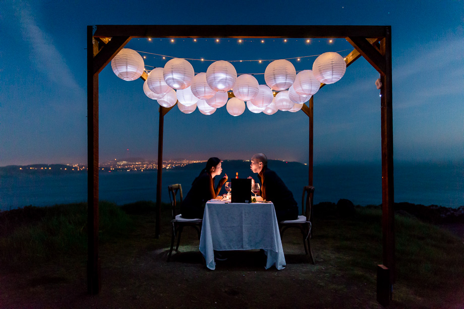 romantic private sunset engagement dinner after the surprise proposal on top of the hill in San Francisco