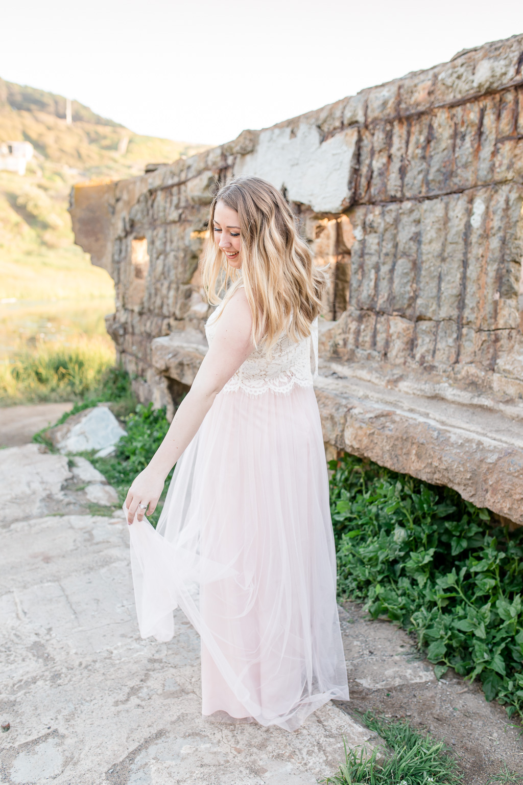 playful outdoor portrait with blush tulle dress at Lands End