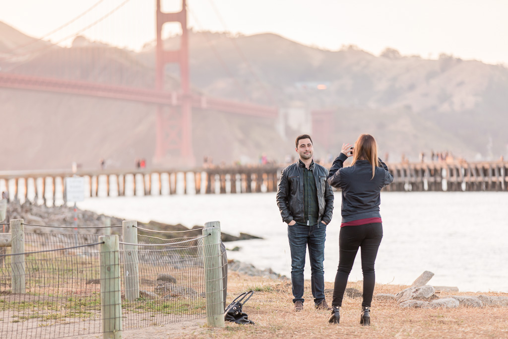 taking a photo of the Golden Gate Bridge