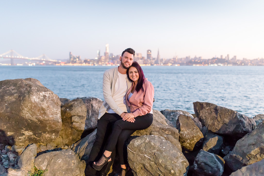 engagement photo with San Francisco city view in the background