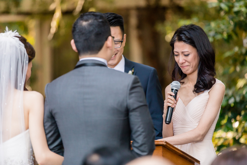 emotional moment with officiant crying during wedding ceremony