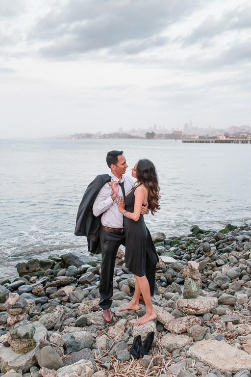 Presidio engagement picture with San Francisco city skyline in the background