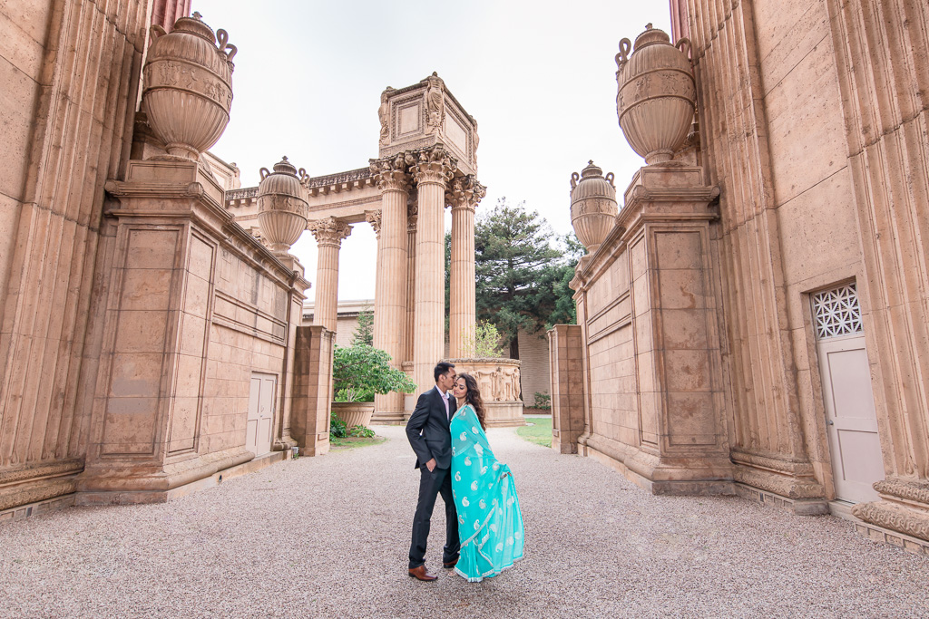 engagement photo with suit and sari at the Palace of Fine Arts